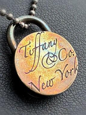 Jewelry AUTH Tiffany & Co. Silver New York Notes Round Padlock Charm Pendant 925